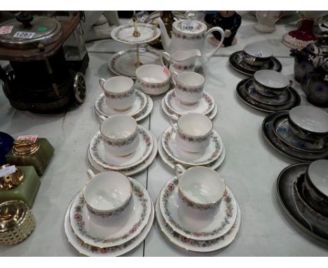 Paragon tea service in the Belinda pattern of twenty two pieces. Not available for in-house P&amp;P 