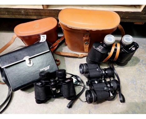 Three pairs of cased binoculars including Tasco. UK P&amp;P Group 2 (£20+VAT for the first lot and £4+VAT for subsequent lots