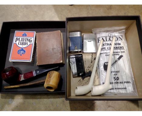 Mixed smoking related items to include pipes, pipe cleaners, cigarette lighters and playing cards. Not available for in-house