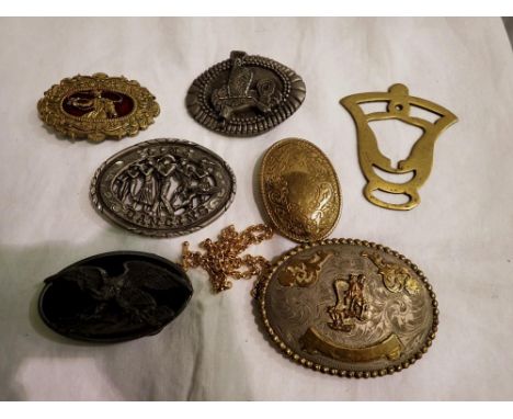 Seven American belt buckles. UK P&amp;P Group 1 (£16+VAT for the first lot and £2+VAT for subsequent lots) 