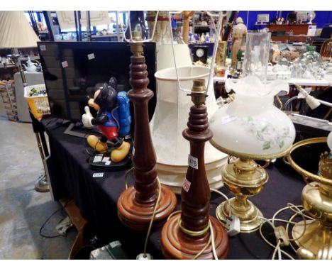 Two wooden lamps with shades and stems and another. All electrical items in this lot have been PAT tested for safety and have