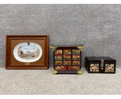 Two contemporary Oriental jewellery/trinket boxes to include a pagoda chest of nine short over two long drawers with brass em