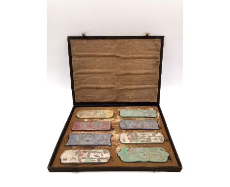 A Chinese calligraphy stone ink block set circa 1900, intricately carved in relief, hand painted, and with gilt embellishment