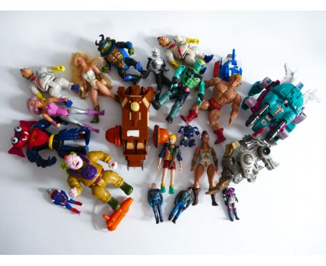 This is a lot of ACTION FIGURES made in the 1980's / 1990's. Includes HE-MAN, TRANSFORMERS, MASK and GHOSTBUSTERS amongst oth