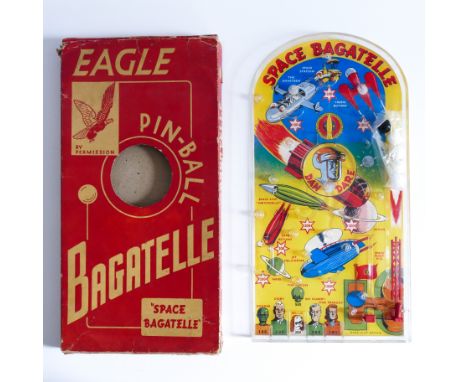 DAN DARE SPACE BAGATELLE made in ENGLAND by METTOY in the 1950's. Comes in original packaging with balls.