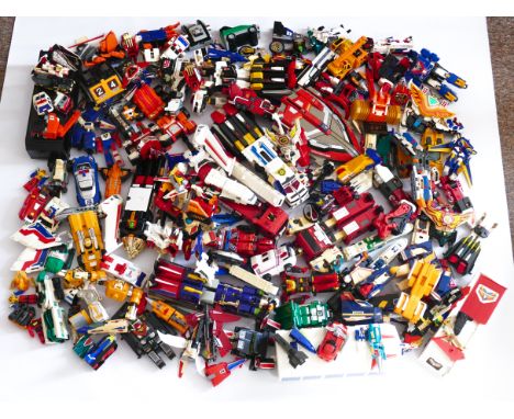 This is a huge lot of TRANSFORMING ROBOTS released in JAPAN by TAKARA in the 1990's. Mostly from the BRAVE series which came 
