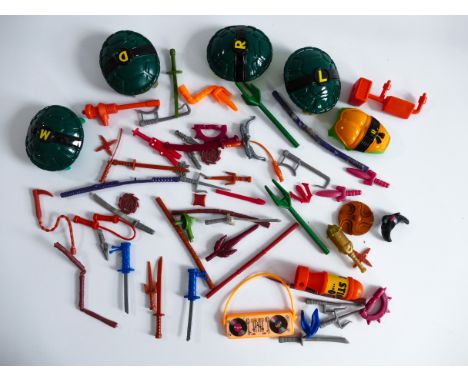 This is a lot of TEENAGE MUTANT NINJA TURTLES parts and accessories mostly made by PLAYMATES in the 1990's although there may