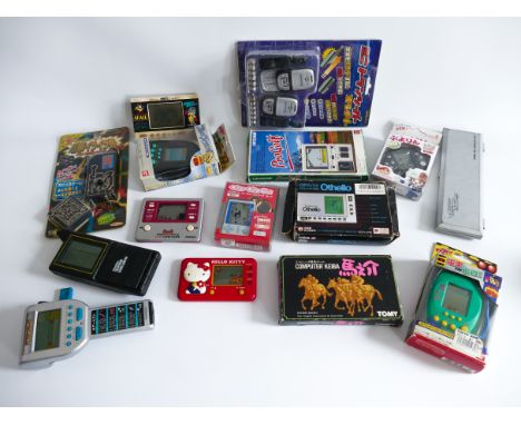 This is a lot of vintage handheld computer games made by NINTENDO, BANDAI, TOMY, GAKKEN etc. Most were purchased in Japan in 
