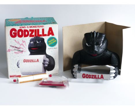 An official electronic GODZILLA LOO ROLL HOLDER. Comes complete and unused in original packaging. Made by BEETLAND in the 198