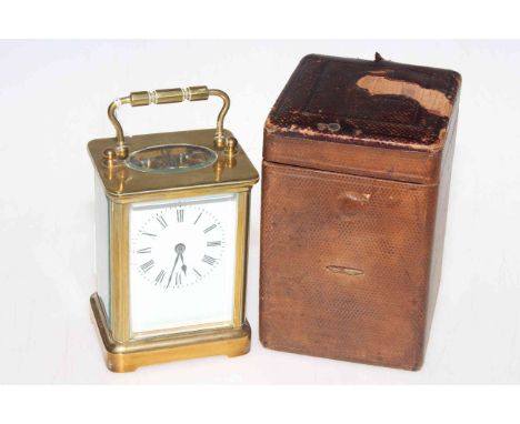 Gilt brass carriage clock with travel case