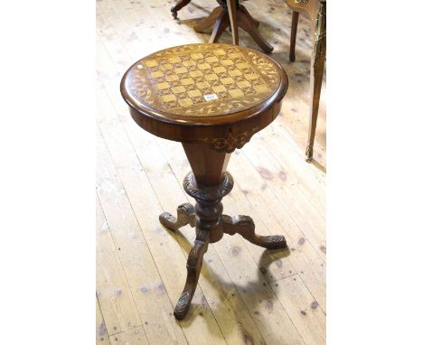 Victorian walnut inlaid sewing table with chess board top raised on carved tripod base