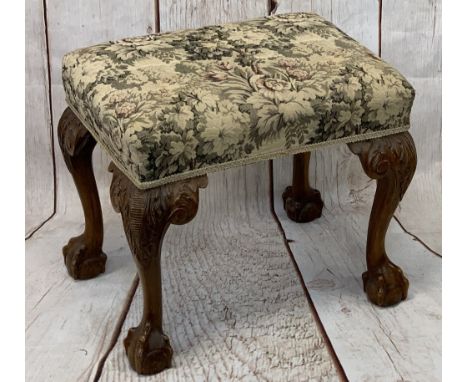 CARVED WALNUT DRESSING STOOL - tapestry style upholstered top with leaf carving to the knees on ball and claw feet, 48cms H, 