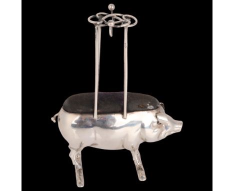 An Edwardian novelty silver pig hat pin cushion, Adie & Lovekin Ltd, Birmingham 1905, height 10.5cm . Condition Report:Genera