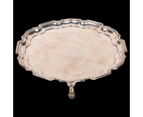 MAPPIN & WEBB - a George VI silver salver, scalloped rim raised on 3 feet, 20.5cm, 9.9oz . Condition Report:2 extremely light