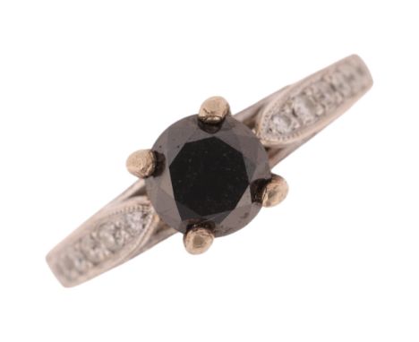 An American 14ct white gold 1ct single stone diamond ring, by S Kashi, claw set with modern round brilliant-cut black diamond