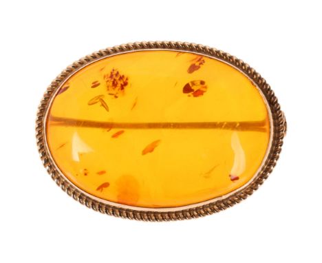 A 9ct gold amber brooch, maker RBS, Birmingham 1982, 33.1mm, 5.3g . Condition Report:No damage or repair, a few light surface