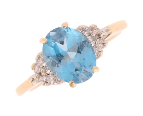 A 9ct gold blue topaz and diamond dress ring, maker GF Ltd, London 1989, set with oval mixed-cut topaz and single-cut diamond