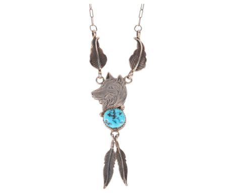 A Native American Navajo sterling silver turquoise wolf pendant necklace, maker BJ, pendant 62.8mm, necklace 50cm, 12.7g . Co
