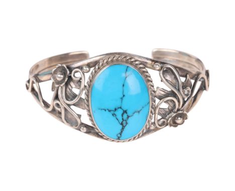 A Continental sterling silver simulated turquoise cuff bangle, floral shoulders, setting height 31.2mm, internal circumferenc