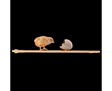 An Edwardian 15ct three-colour gold platinum 'Chick and Egg' bar brooch, realistically designed as a chick with round cabocho