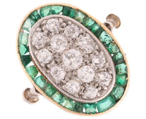An Art Deco platinum emerald and diamond panel ring, the oval panel pave set with old-cut diamonds surrounded by a single row