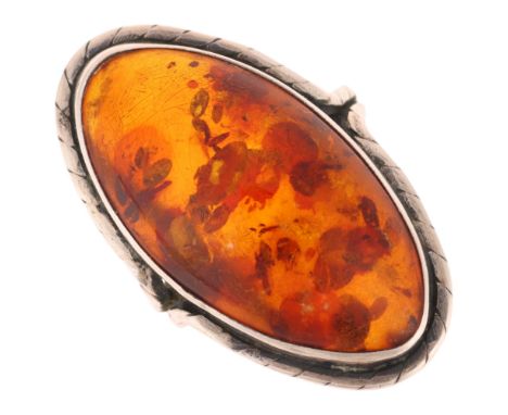A Polish sterling silver Baltic amber ring, setting height 32.2mm, size N, 6.9g . Condition Report:Amber has 1 tiny chip and 