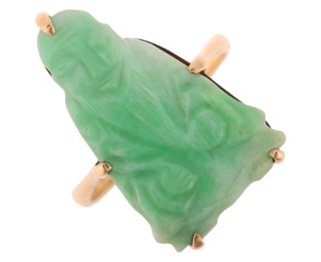 An Antique 9ct gold jade 'Buddha' panel ring, maker N Brothers, relief carved depicting bearded Buddha, setting height 23mm, 