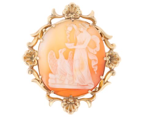 A 19th century 9ct gold shell cameo brooch, relief carved depicting Hebe feeding eagle Zeus, within openwork foliate frame, u