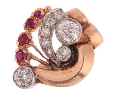 A retro 14ct rose gold ruby and diamond odeonesque cocktail ring, set with round-cut rubies and old European-cut diamonds, to