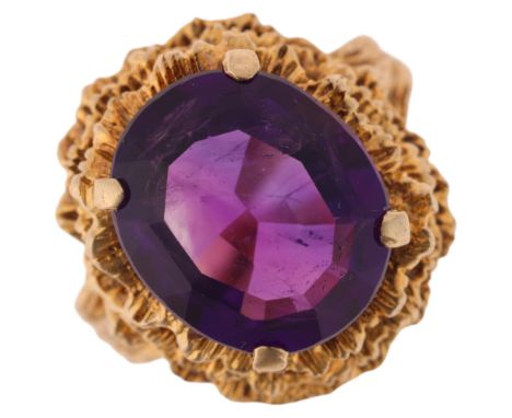 A Vintage 9ct gold single stone amethyst abstract ring, maker HB, London 1967, set with oval-cut amethysts within naturalisti