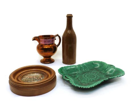 A Collection of Wedgwood and other green glazed leaf plates,comprising three shaped dishes and six plates,largest 28cm wideto