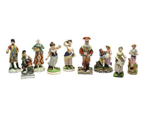 A collection of porcelain figures,comprising a Chelsea style example depicting a woman holding a basket, gilt anchor mark to 