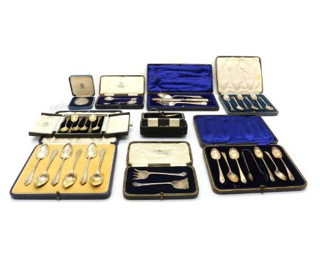 A collection of cased silver flatware,comprising eight sets, to include a pair of Scottish silver teaspoons with stag head cr