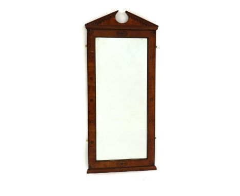 A Biedermeier style satin birch framed mirror,with pedimented architectural frame, inlaid with roundels,66cm wide148cm highSo