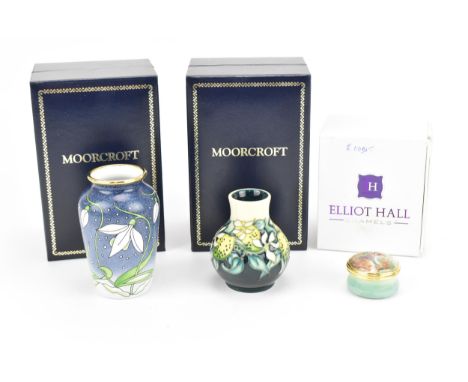A Moorcroft enamels 'snowdrop' pattern miniature vase, designed by Rachel Bishop, 1998, 7 cm high, together with an Elliot Ha
