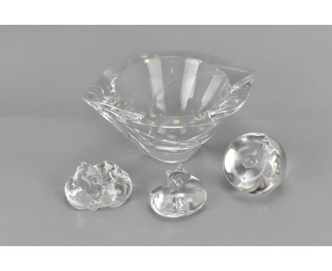 A Swedish Orrefors glass bowl, with etched signature to underside, 20.5 cm wide, together with two Steuben glass animal paper