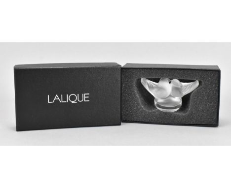 A boxed Lalique lovebirds paperweight, in frosted and clear glass, signed to base 'Lalique R France', within padded box 