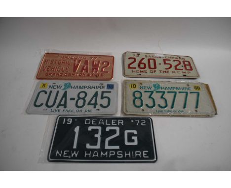 Five various American number plates
