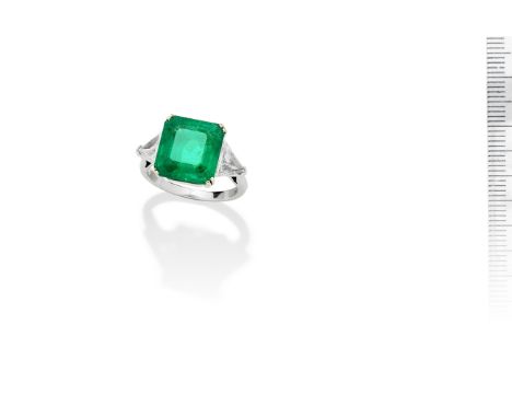 An emerald ringThe step-cut emerald, approximately 6.10 carats, between triangular-cut shoulders, ring size MFootnotes:Accomp