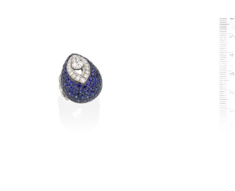 A sapphire and diamond 'Pavilion' ring, by GraffOf peacock feather inspiration, set with a central pear-shaped diamond, weigh