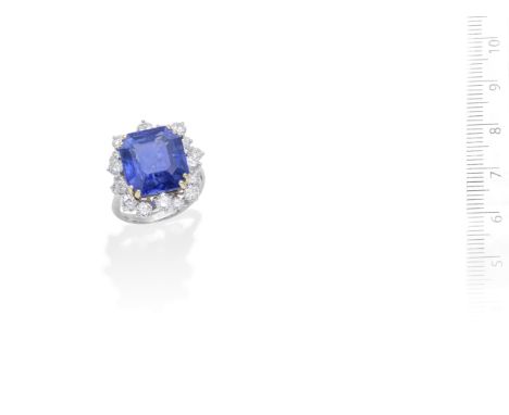 A sapphire and diamond ringThe step-cut sapphire, weighing 17.29 carats, within a surround of brilliant-cut diamonds, French 