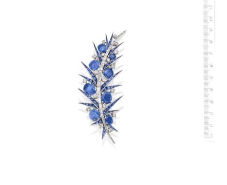 A sapphire and diamond brooch, by Jean Parmentier, circa 1958The abstract spray set with brilliant-cut diamonds, oval and cal