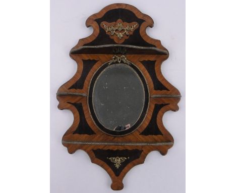 A 19th century French walnut wall hanging display shelf,with gilt metal mouldings and mounts and inset mirror, height 90cm.