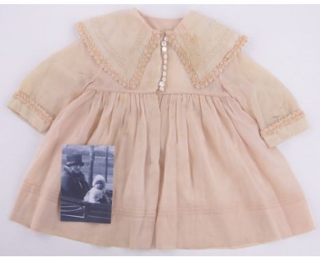 A collection of children's dresses and clothes originally belonging to Princess Elizabeth and Princess Margaret,including a p