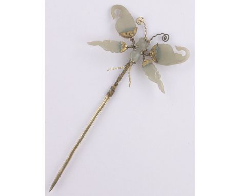 A Chinese silver gilt and jade butterfly design en tremblant hair pin,length 17cm, wing span 8.5cm.