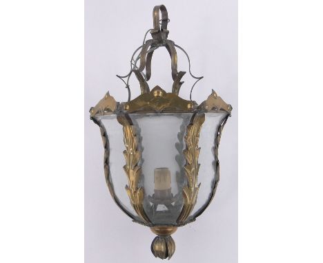 A continental brass framed lantern light fitting,circa 1900, with serpentine shaped glass panels, overall height 54cm.