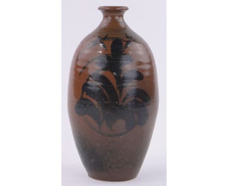 A brown glazed Studio pottery narrow necked vase in the manner of Bernard Leach,with painted leaf designs, impressed studio m