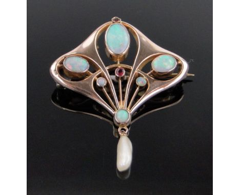 An Art Nouveau 9ct gold opal and garnet set open work brooch,width 32mm.