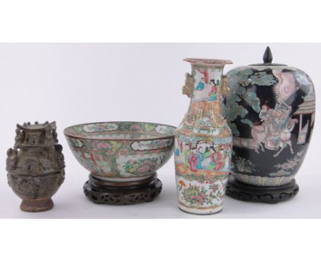 A Chinese Canton enamel bowl on hardwood stand,and a small Canton enamel vase (2).