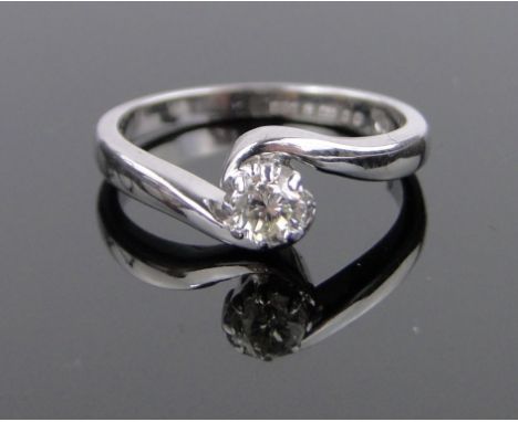 An 18ct white gold 0.25ct solitaire diamond ring,size K.